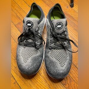 Nike Women’s Black and Gray Flyknit Sneakers